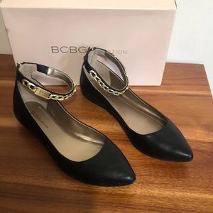 BCBGeneration Black Leather Flats w/Chunky Gold